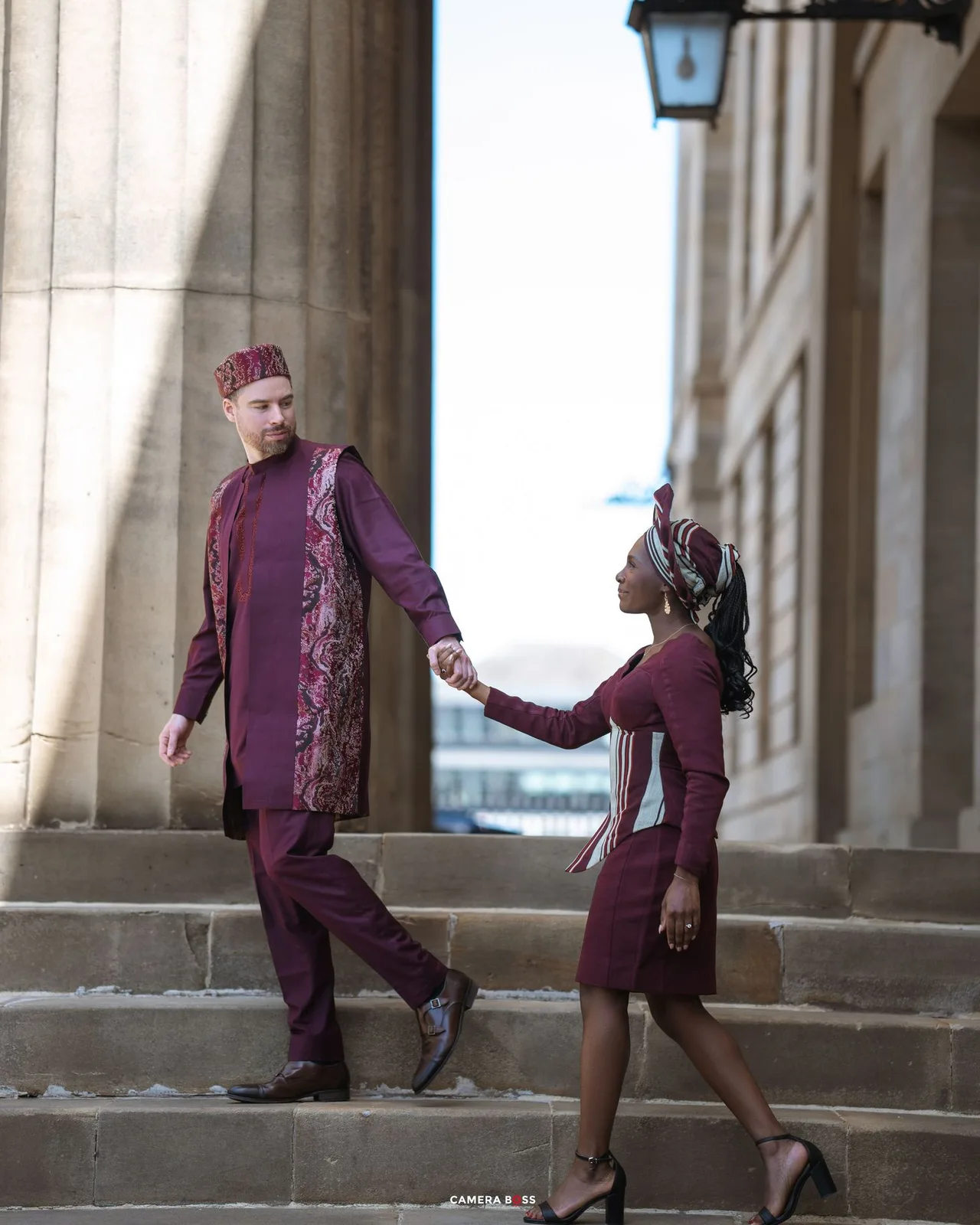 A figure in a purple suit strikes various dynamic poses in a sequence of connected architectural shots.