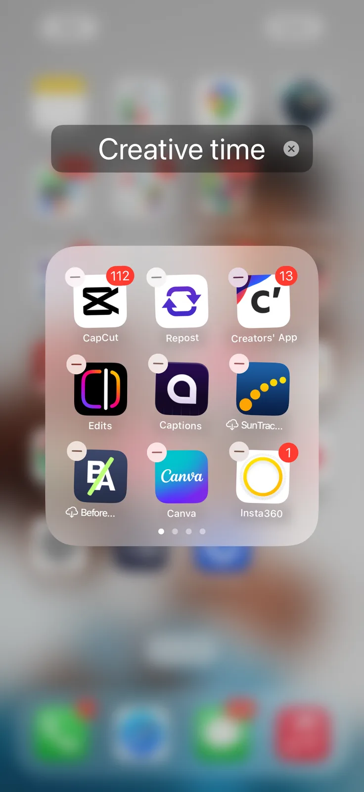 A smartphone screen showing a 'Creative time' folder with app icons including EpicCut, Repixr, Canva, and editing tools.
