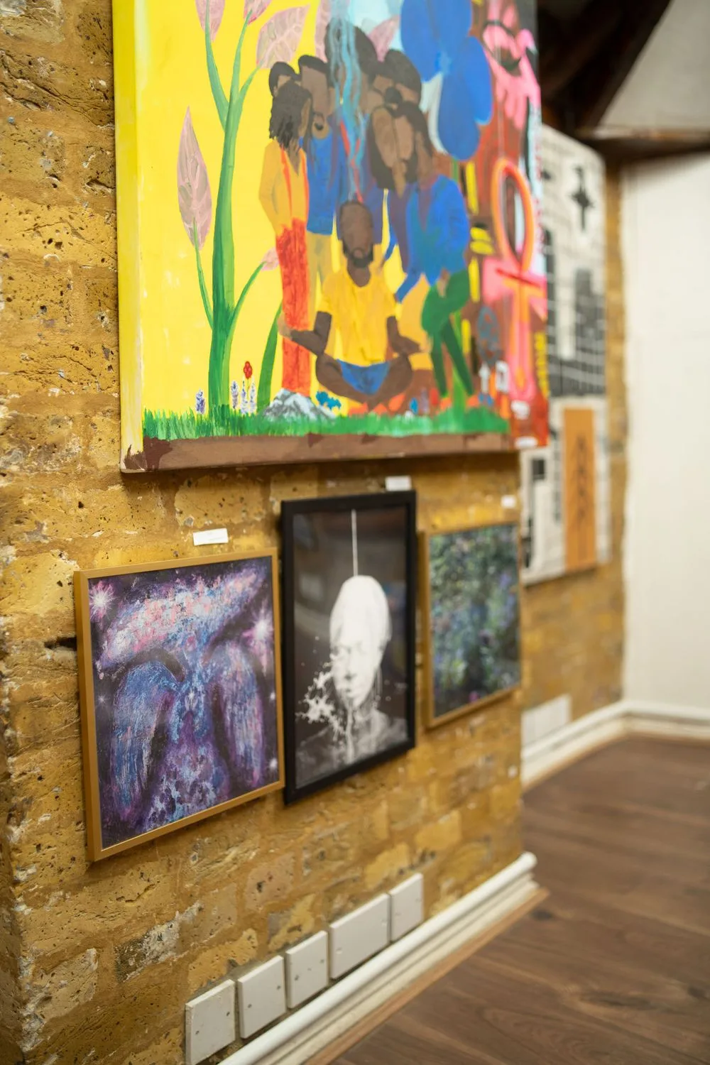 Full view of Dreams and Nightmares exhibition at Boomer Gallery London showing colourful mixed media artworks displayed across the gallery wall
